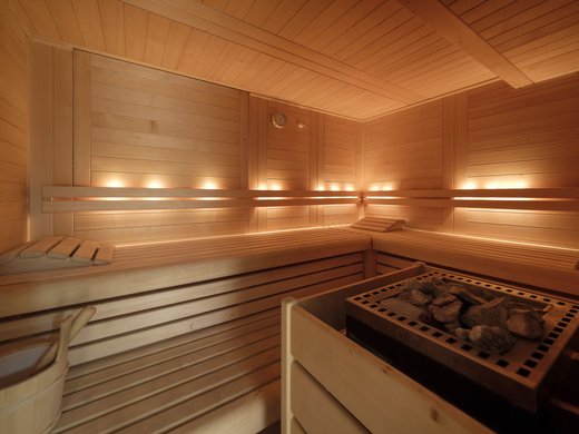 Welcome to our conference hotel in Upper Bavaria! Bright wooden sauna with stone heater and ambient lighting